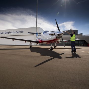 Pilot doing pre-flight checks on PC-12 at Adelaide base