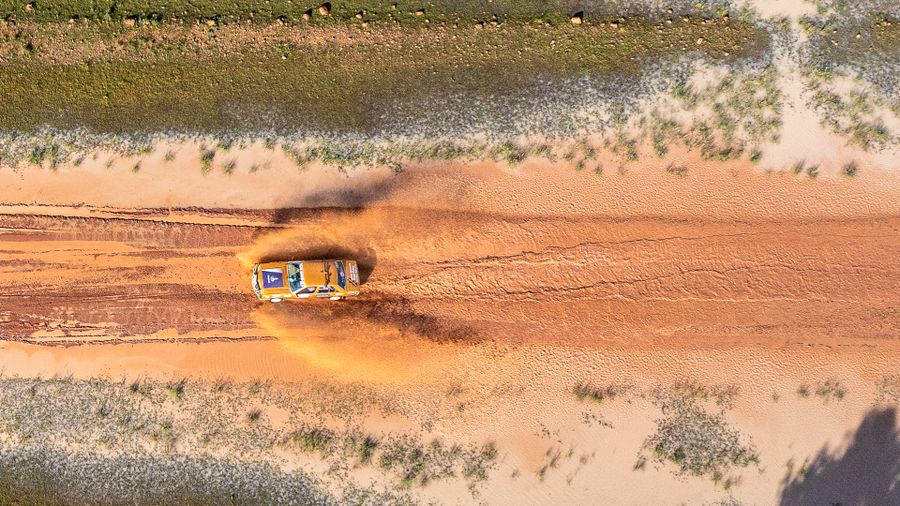 Car on dirt road 
