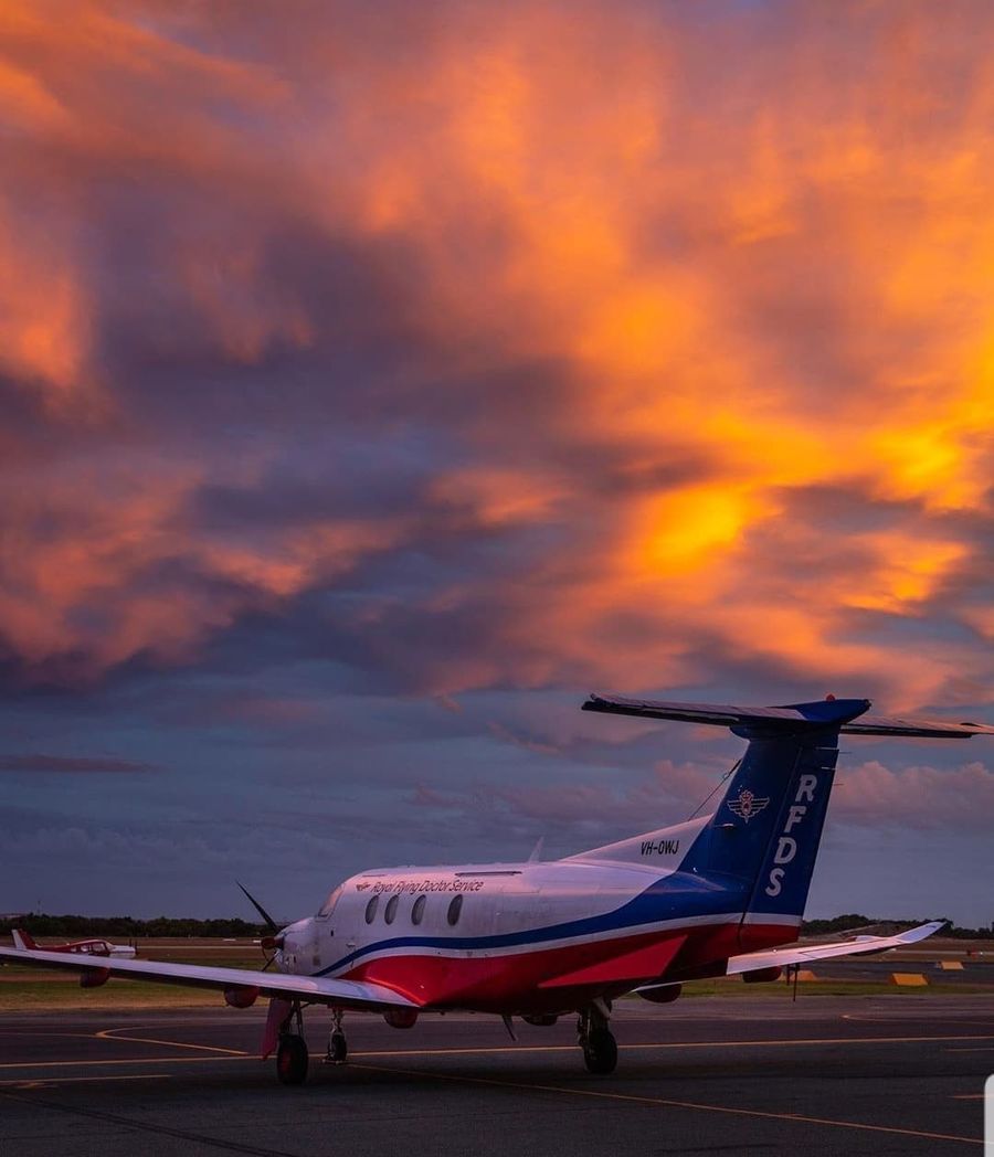RFDS WA FMG Medi Helicopter on tarmac at Jandakot