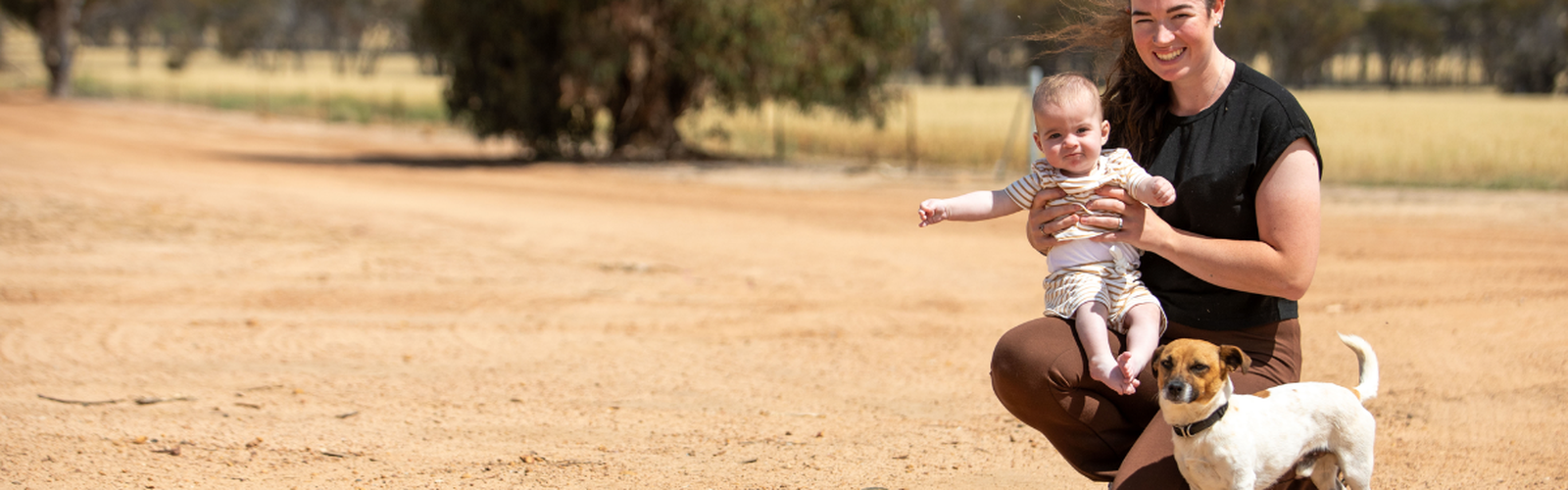 Helen and baby Theo at the Christmas tree