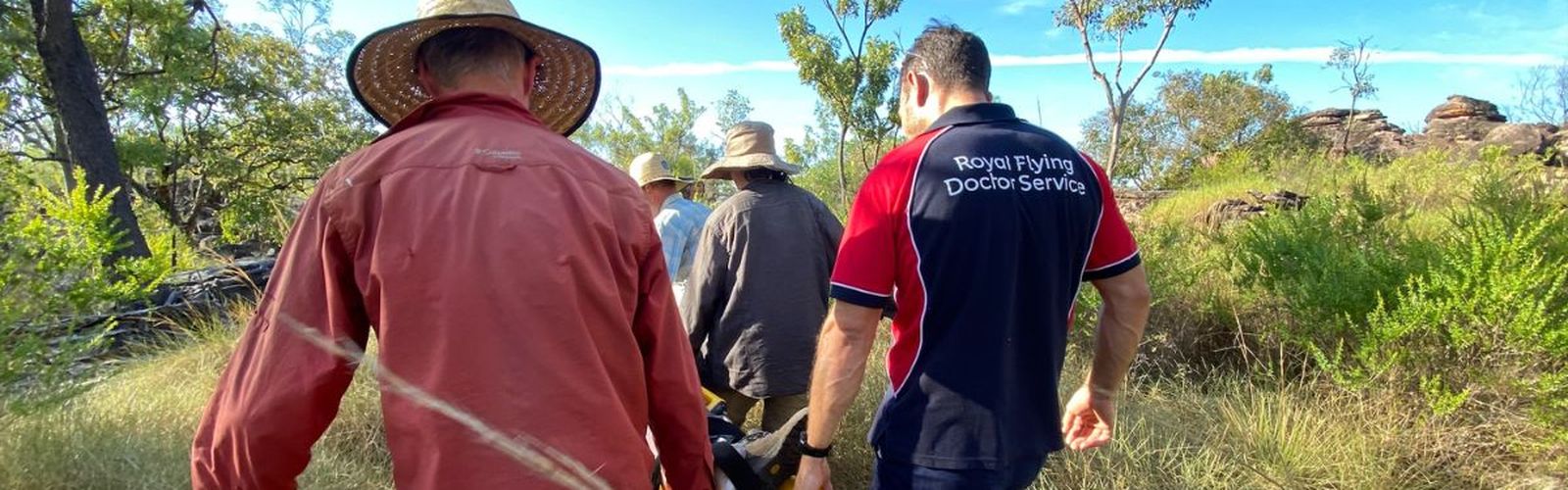Transferring a patient through rocky terrain
