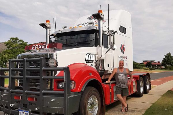 Lee standing in front of his truck.