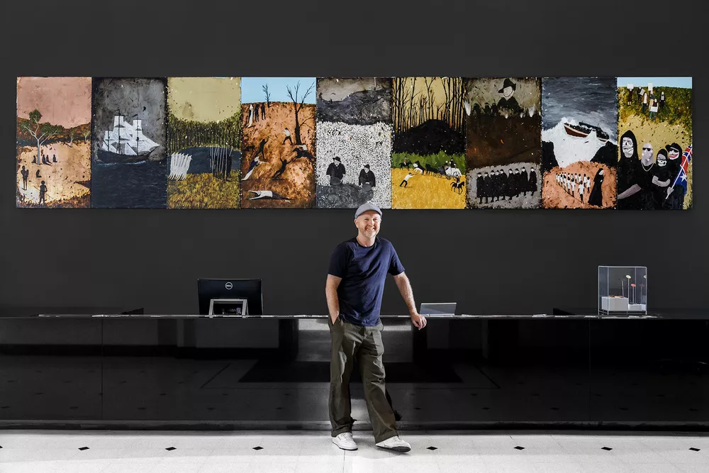 2019 Ramsay Art Prize Judge, Richard Lewer standing in front of his installation 'The History of Australia'