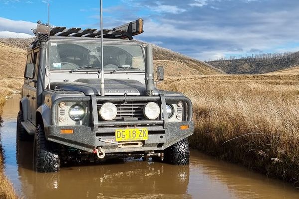 Doug and his 4WD stuck in boggy water hole