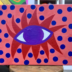 A painting of an eye with a pink background and blue dots surrounding it