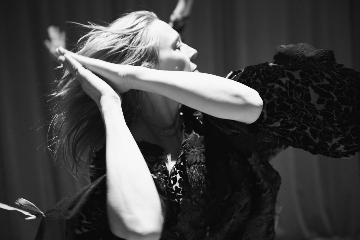 Black and white photograph of Jo Lloyd dancing - movement