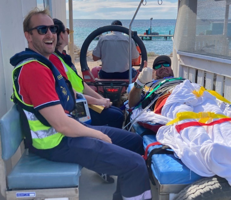 Justin smiling with the RFDS crew before getting in the heli.