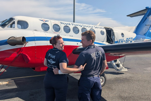 Bern and Steve with matching pilot shirts