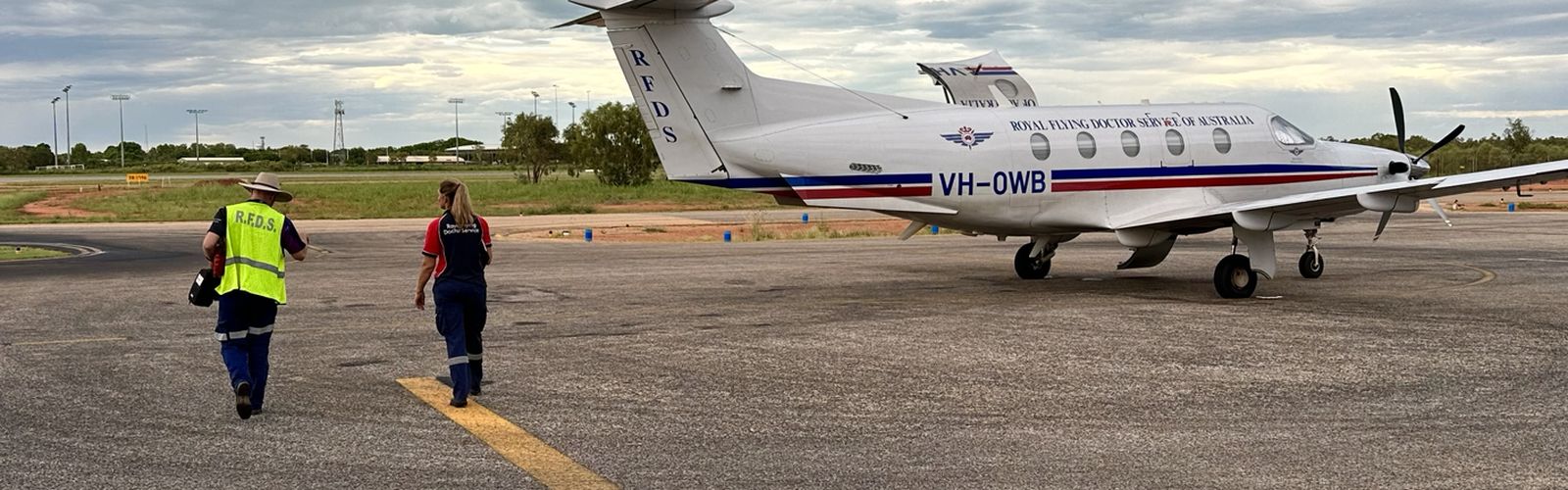 rfds wa pilot and nurse walk out to PC12aircraft at broome base