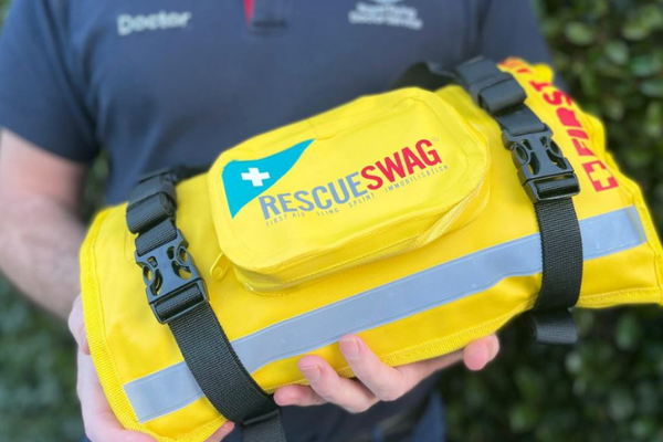 bright yellow Rescue Swag on fence