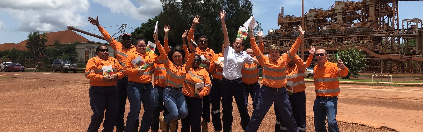 Rio Tinto staff jumping with joy after mental health training in February.