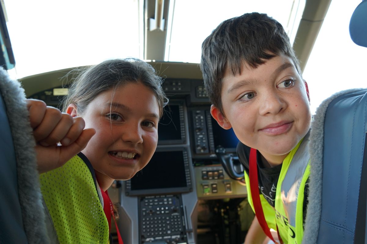 Jeremy and sister Kate checking out the cockpit of  PC-12 turboprop aircraft 'Isla' 
