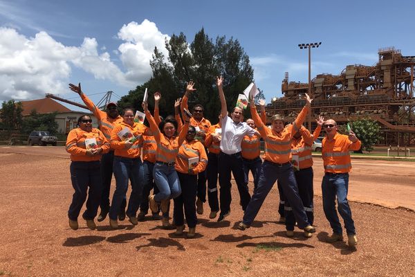 Rio Tinto staff jumping with joy after mental health training in February.