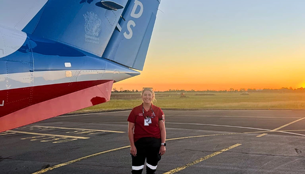 Abi in front of aircraft