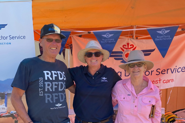 Victoria in between community members