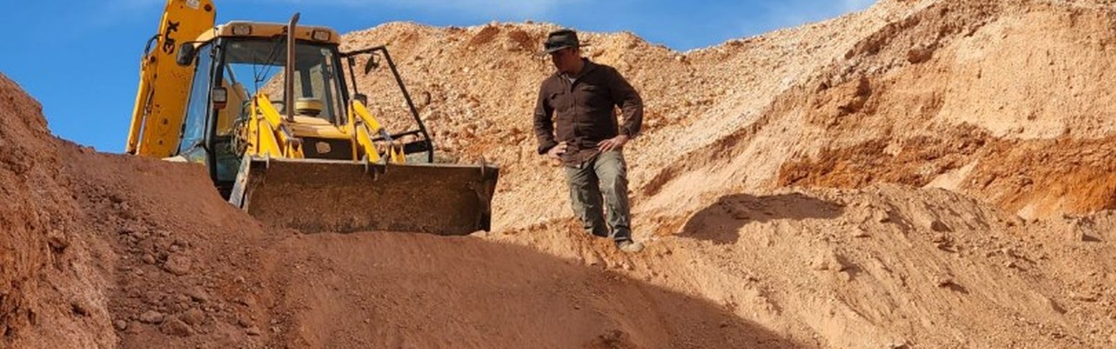 Dan in Opal Mining Location in SA