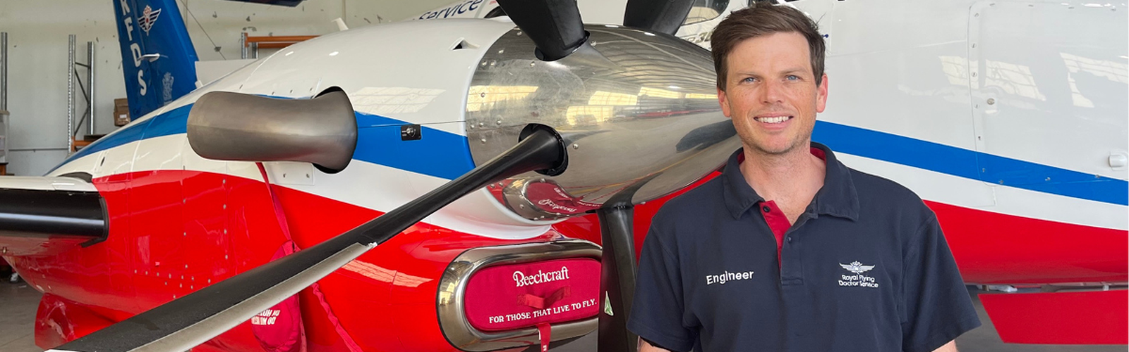 Nick Mann standing in the hangar