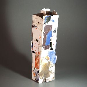 slab built porcelain vessel with small flecks of blue
