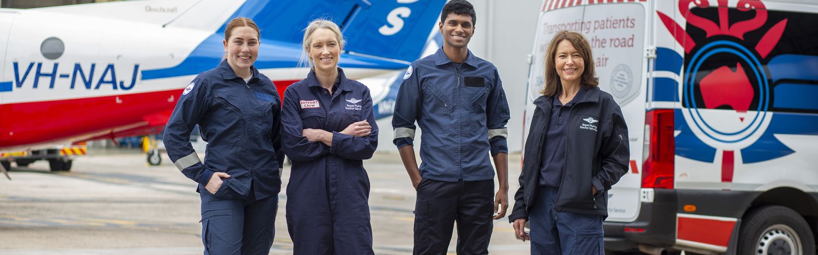 Royal Flying Doctor Service Team in front of their Transport vehicles