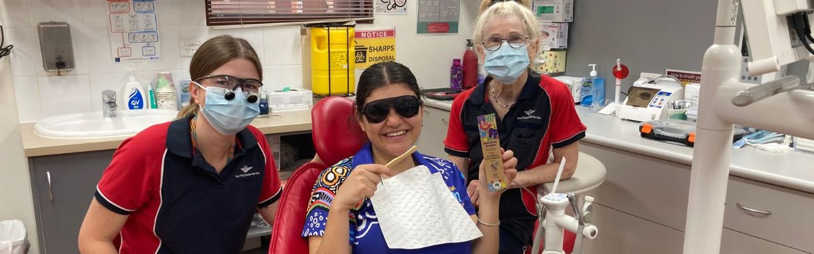 Dentist Michiel De Beer and Dentist Alexandra Dreher with a patient