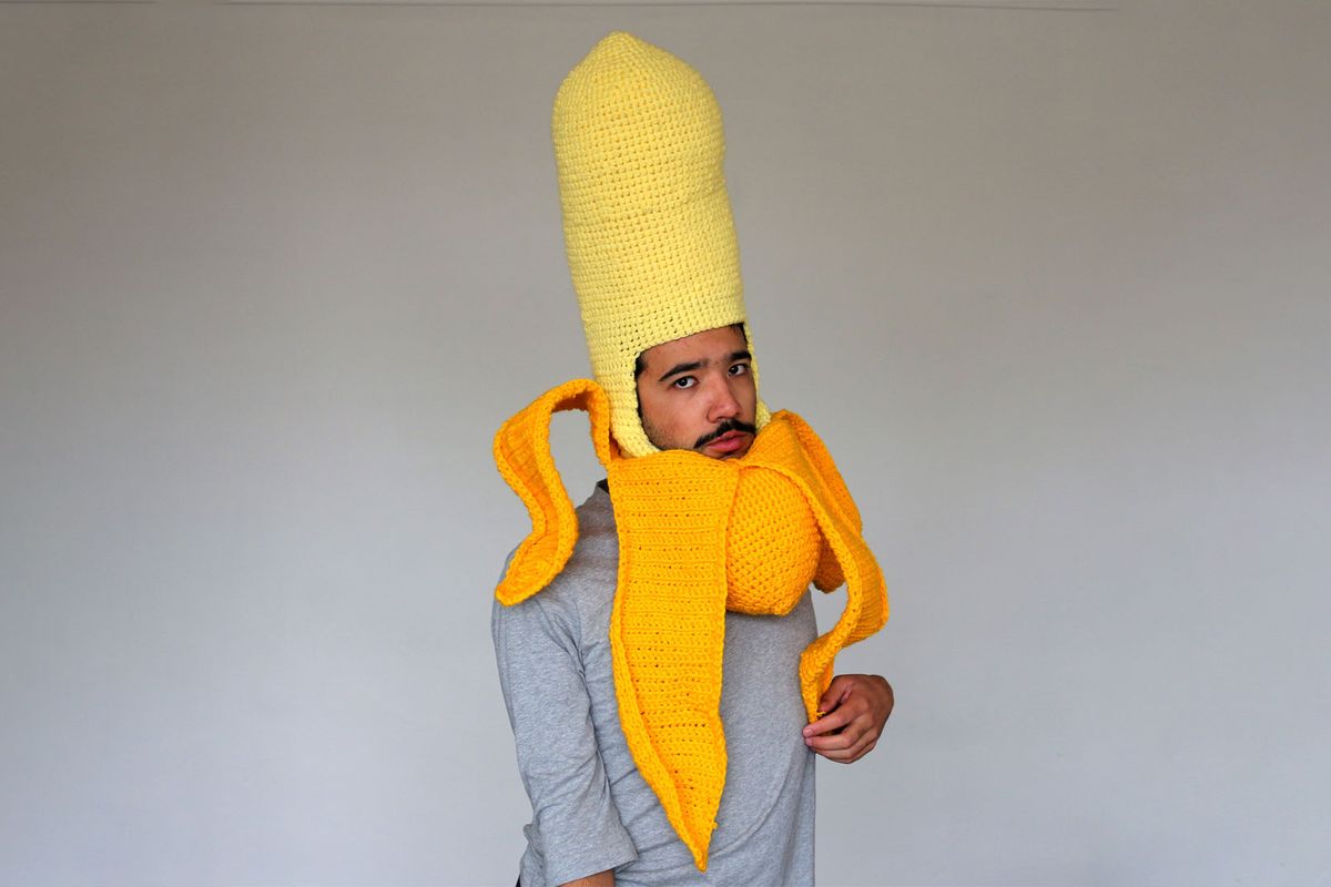 Phil Ferguson aka artist Chili Philly wearing one of his crochet headwear creations, a banana