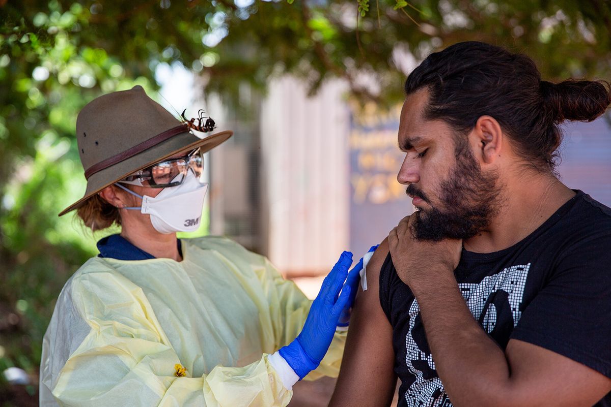 RFDS Nurse Jodie Tayler vaccinating patient on Galinwin'ku