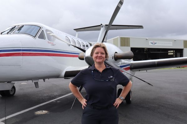 RFDS Pilot Hayley Wood with an RFDS Aircraft