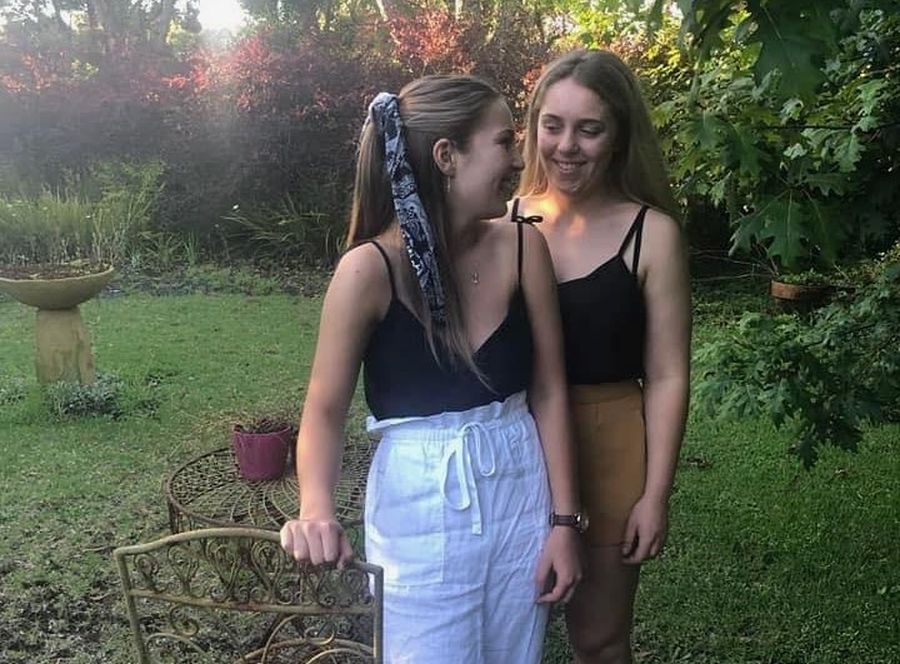 Laura and her sister Emily pictured in happier times, before the car accident that left Laura with a severe brain injury.