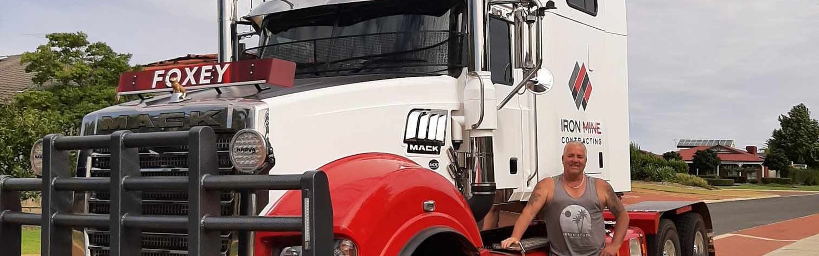 Lee standing in front of his truck.