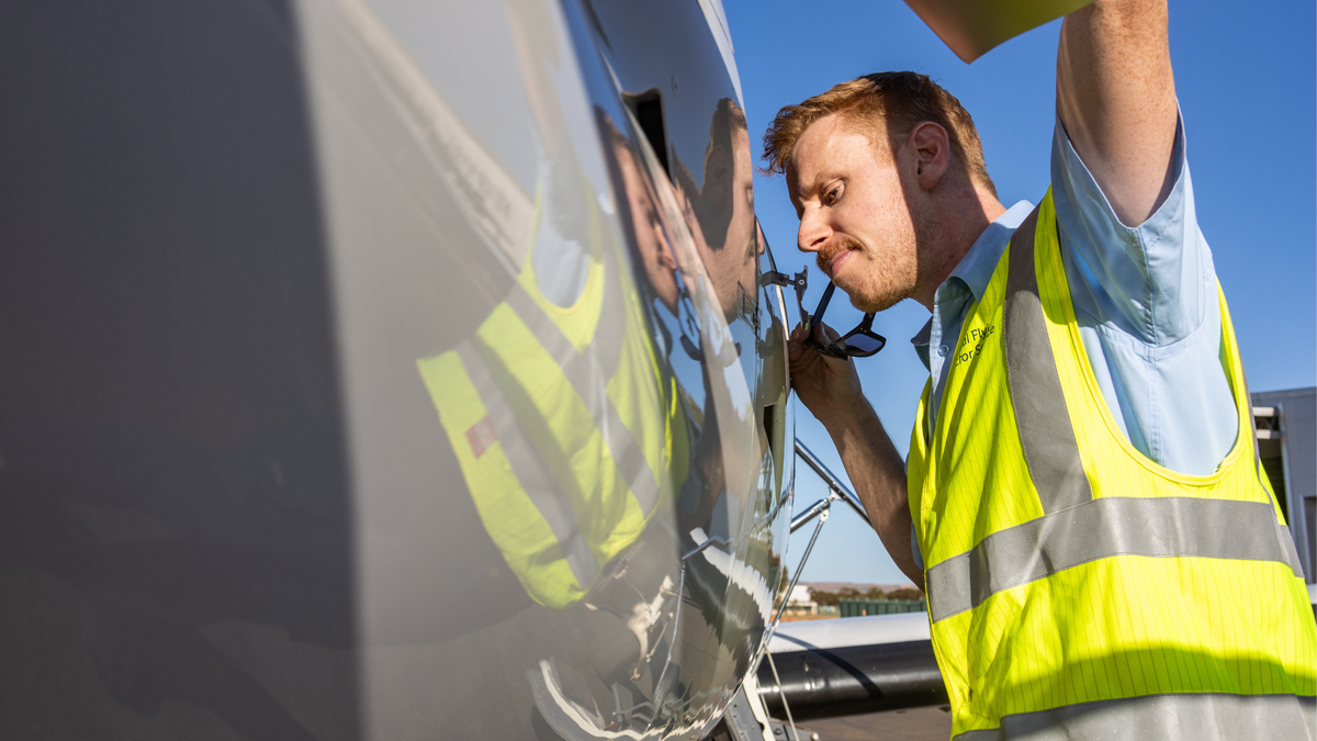 Pilot James doing pre-flight checks