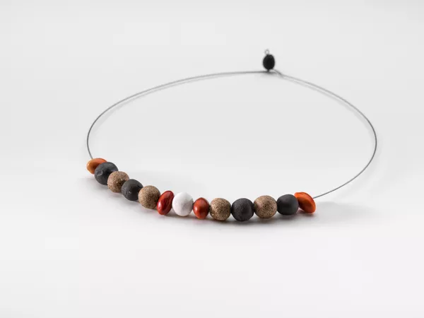 Jayanna Andy, Pitjantjatjara people, born 1999, Pukatja (Ernabella), South Australia, Roxanne Carroll, Pitjantjatjara people, born 1997, Pukatja (Ernabella), South Australia, Marceena Jack, Pitjantjatjara people, born 1996, Mparntwe (Alice Springs), Northern Territory, Vennita Lionel, Pitjantjatjara people, born 1998, Pukatja (Ernabella), South Australia, Nicole Rupert, Pitjantjatjara people, born 1987, Mparntwe (Alice Springs), Northern Territory, Marissa Thompson, Pitjantjatjara people, born 1985, Pukatja (Ernabella), South Australia, Liritja II, 2019, Pukatja (Ernabella), South Australia, ceramics, ininti seeds and stainless steel,
16.0 cm (diameter); © Ernabella Arts Inc., photo: Grant Hancock