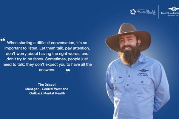 Manager of Outback Mental Health Services, Tim Driscoll, is pictured smiling on a blue background. Next to Tim is white text and a quote.