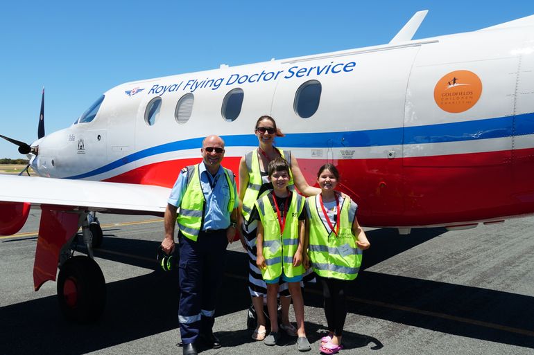 Jeremy and his family at the RFDS Jandakot base 