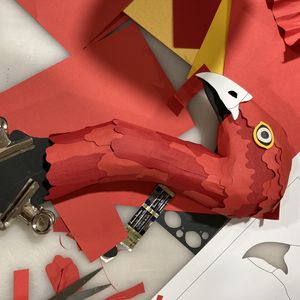 Red paper prototype of Brush Turkeys head