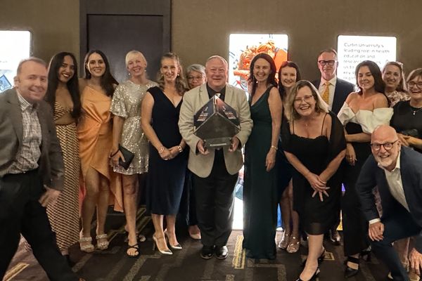 Paul with colleagues at the awards night.