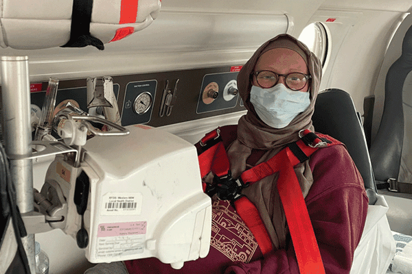 Anna holding her baby