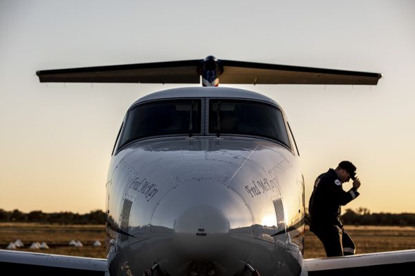 Pilot disembarking from plane